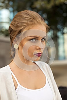 Face of the young beautiful woman outdoors