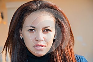 Face of a young mulatto woman close-up