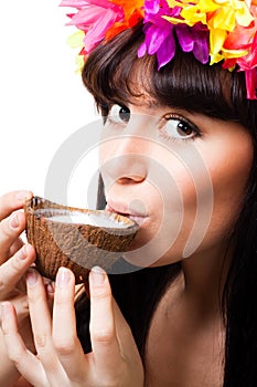 Face of a young woman drink coconut milk