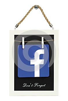 Facebook icon on wooden frame