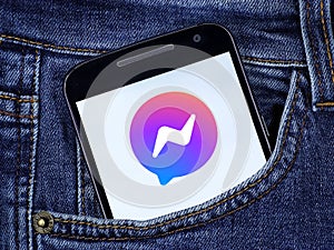 Facebook Messenger logo on the smartphone screen.