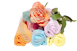Facecloth rolls various shades rose and soaps