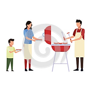 Faceless family cooking barbecue food
