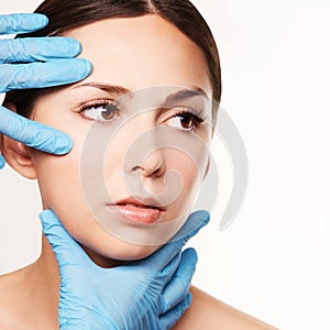 Facelift hydra treats. Esthetic skin care analysis. Doctor hands in gloves.