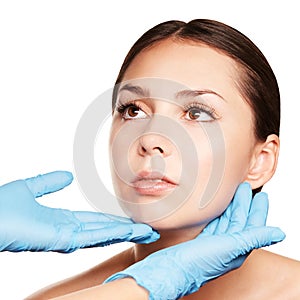 Facelift hydra treats. Esthetic skin care analysis. Doctor hands in gloves. photo