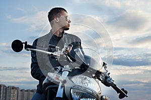 Faceman on the beach with his sportbike