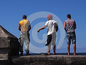 Faces Of Cuba-Fishermen Along The Malacon