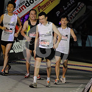 Faces of Pain at the Finish Line