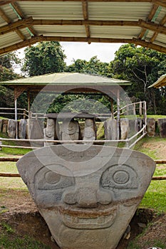 Faces in San Agustin Archeological park, Huilla, Colombia photo