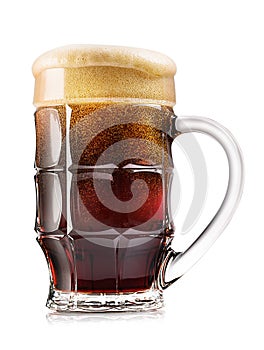 Faceted mug of dark beer