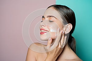 Facial care for female. Keep skin hydrated regularly moisturizing cream. Fresh healthy skin concept. Taking good care of