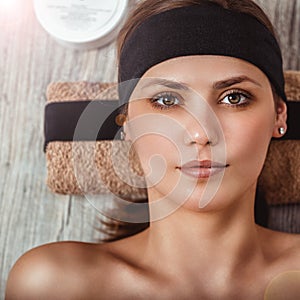 Facial care. Spa. Beauty saloon. Portrait of a beautiful young smiling woman