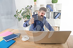 Facial expression. Stress and Pressure at Workplace. Business man holding hammer. Frustrated office worker. Outdated