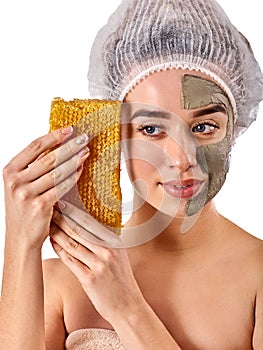 Facial honey clay face mask woman. Honeycombs homemade organic threatment.