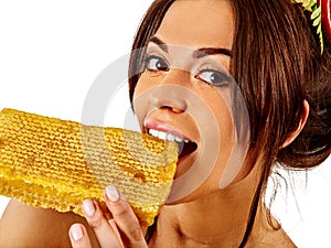 Facial honey mask for woman lips. Honeycombs homemade organic threatment. photo