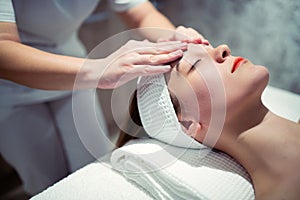 Facial massage treatment by professional