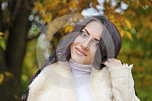 Facial portrait of a beautiful arab woman warmly clothed outdoor