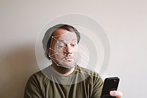 Facial recognition by smartphone allows biometric authentication photo