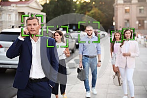 Facial recognition system identifying people photo