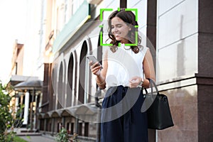 Facial recognition system identifying woman