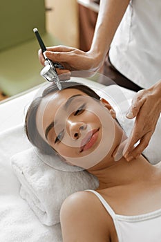 Facial Skincare. Woman Receiving Oxygen Peeling Beauty Treatment