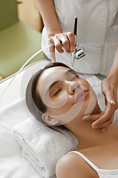 Facial Skincare. Woman Receiving Oxygen Peeling Beauty Treatment