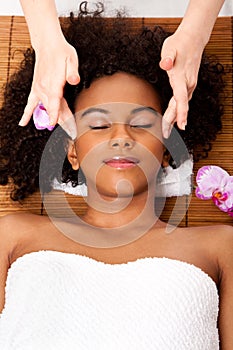 Facial temple massage in beauty spa