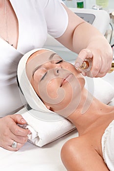 Facial treatment in beauty saloon