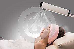 Facial treatment with herbal steamer