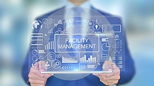 Facility Management, Businessman with Hologram Concept