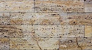 Facing tile from travertine with a smooth surface photo