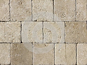 Facing tile from travertine with a smooth surface photo