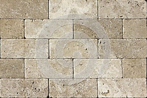 Facing tile from travertine with a smooth surface photo