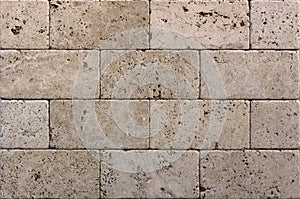 Facing tile from travertine with a smooth surface photo