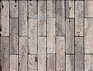 Facing tile from travertine with a smooth surface photo