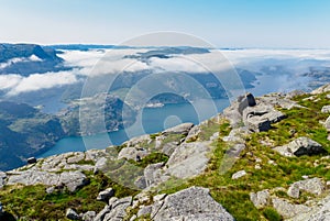 Facing to lysefjord in a foggy morning on the way to Preikestolen, Norway