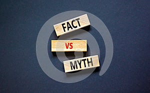 Fact vs myth symbol. Concept words Fact vs myth on wooden blocks on a beautiful black table black background. Business, finacial