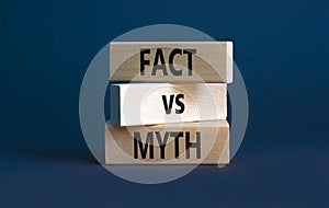 Fact vs myth symbol. Concept words Fact vs myth on wooden blocks on a beautiful grey table grey background. Business, finacial and