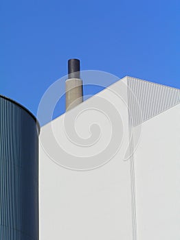 Factory buildings with smokestack