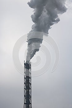 Factory chimney and smoke polluting environment and ecology of planet