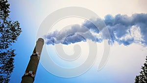Factory chimney is smoking and polluting the environment