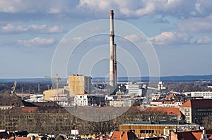 Factory with chimneys in the city