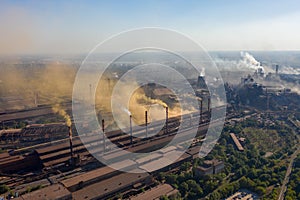 Factory chimneys emit a caustic chemical fume that disrupts the city's ecology