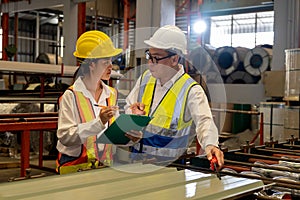 Factory engineer conduct quality control on metal product. Exemplifying