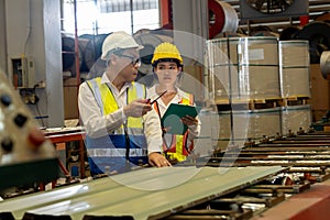 Factory engineer conduct quality control on metal product. Exemplifying