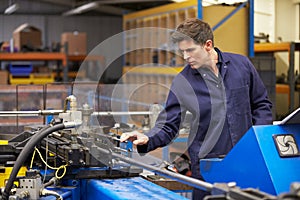 Factory Engineer Operating Hydraulic Tube Bender