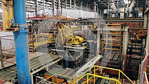 Factory equipment with a robotic arm moving around