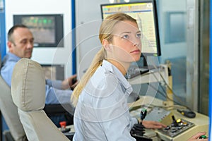 factory female worker in control room