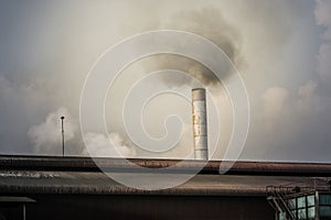 Factory flue emit smoke, pollution, industry that negatively affects the environment