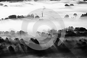 Factory in the fog black and white image